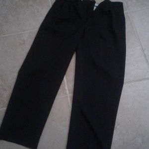 Black pleaded men's dress pants.